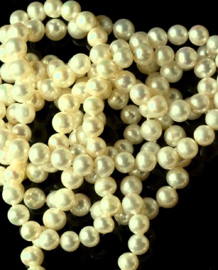Strand of White Cultured Pearls,  of