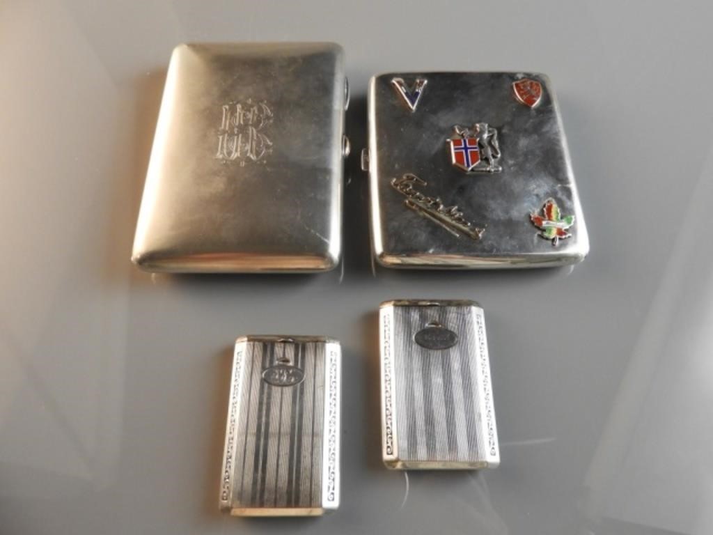 FOUR FINNISH SILVER SMOKING ACCESSORIESConsisting 3a82d9