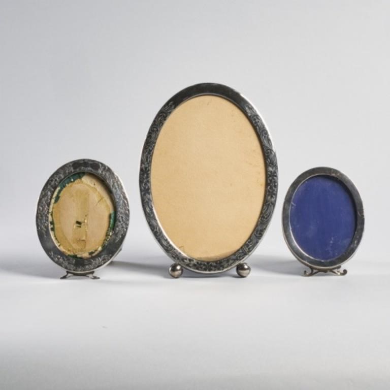 THREE OVAL STERLING PHOTO FRAMESA