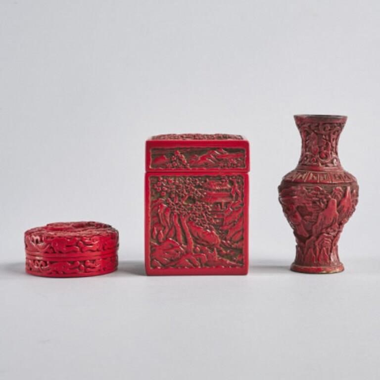 THREE CHINESE MOULDED CINNABAR