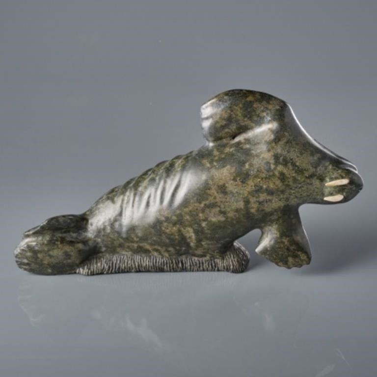 INUIT CARVING BY B. NAKOOLAK (B. 1946)Basking