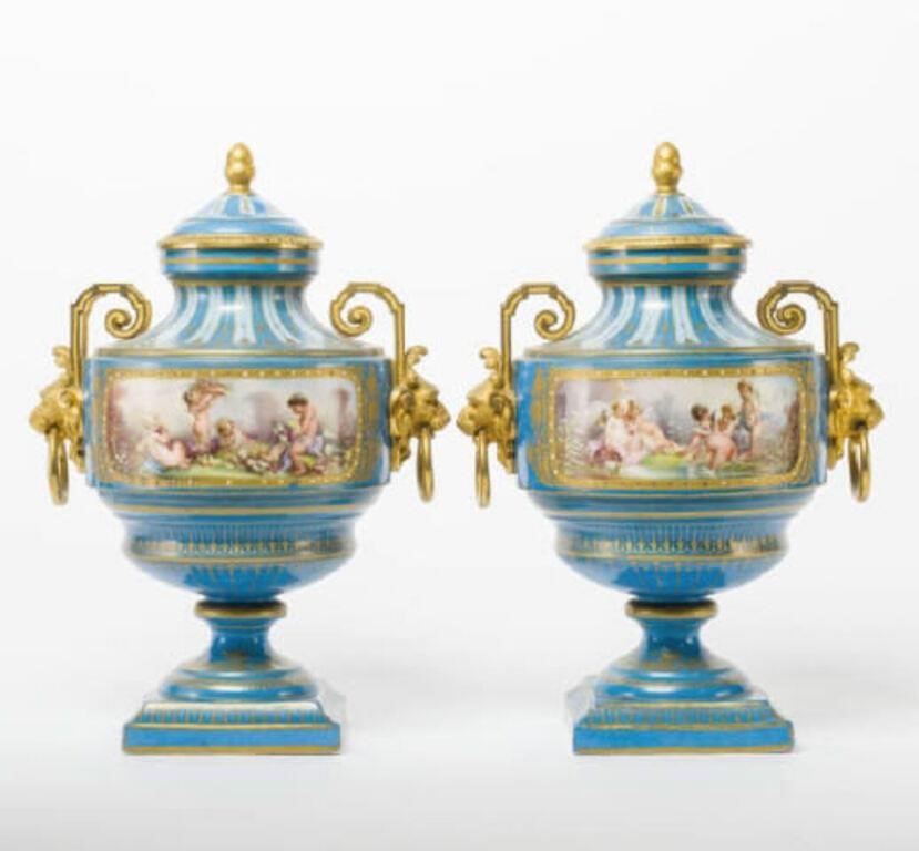 PAIR OF ANTIQUE SèVRES STYLE URNSA