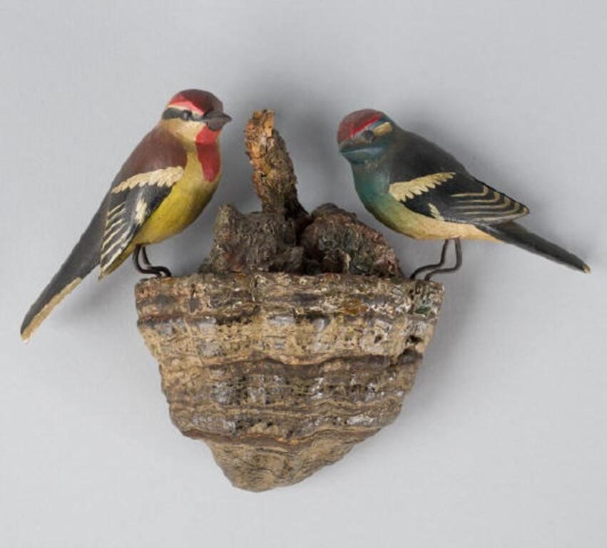 SONGBIRDS SCULPTUREA pair of carved