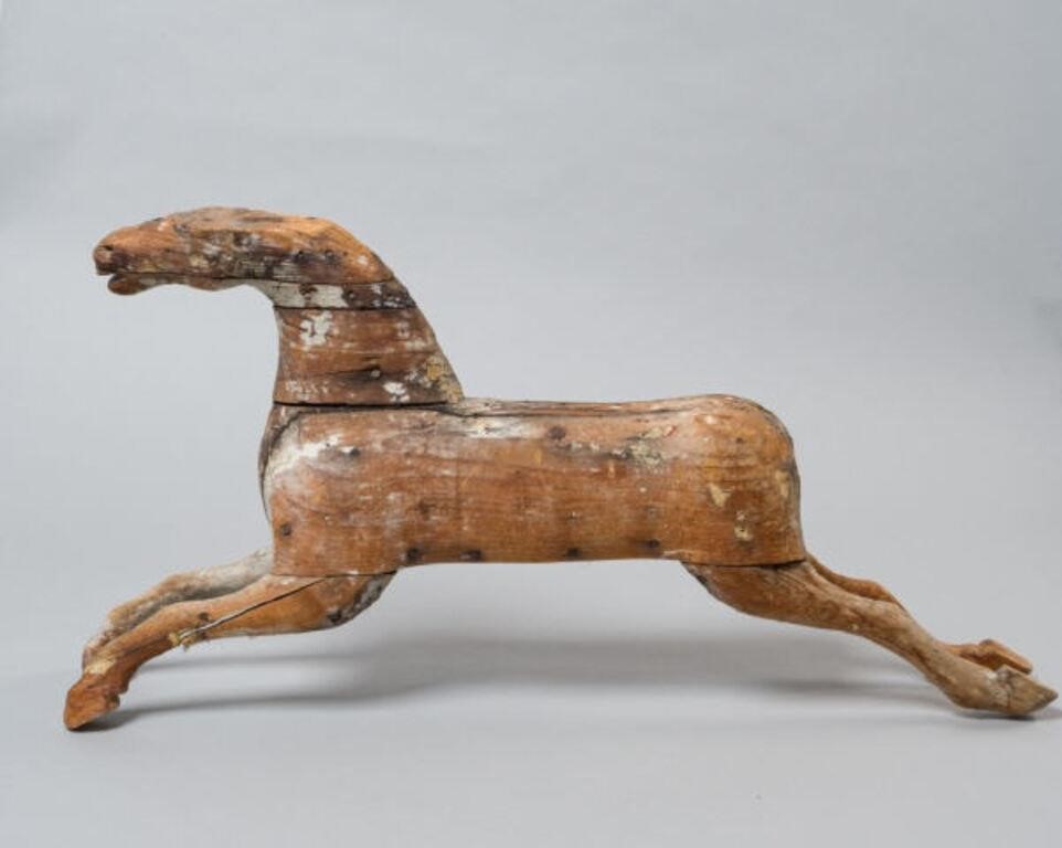 WOODEN HORSEA wooden horse sculpture