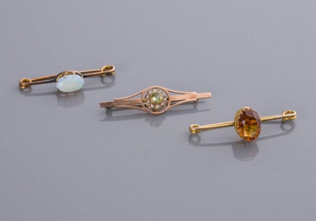 GEMSTONE GOLD BROOCHESBrooches: