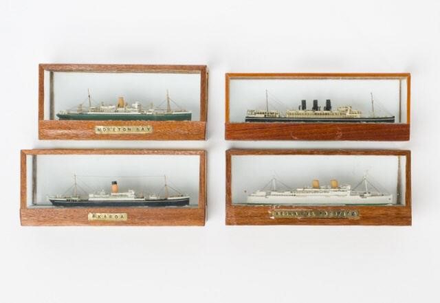 GLASS CASED MINIATURE MODELS OF