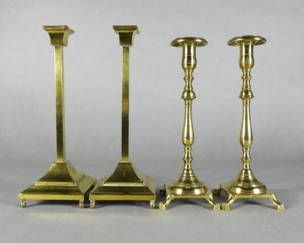 TWO PAIRS OF BRASS CANDLESTICKS,