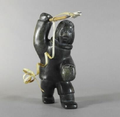 INUIT CARVING OF A HARPOON HUNTER  3a954b