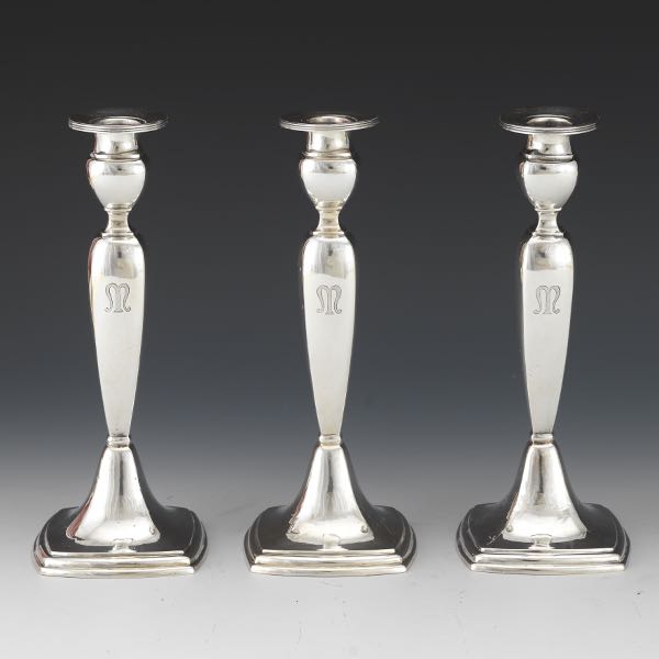 THREE STERLING SILVER CANDLESTICKS 
