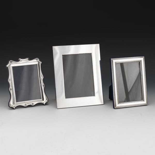 GROUP OF THREE STERLING FRAMES