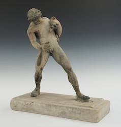 BRONZE SATYR WITH A WINESKIN AFTER