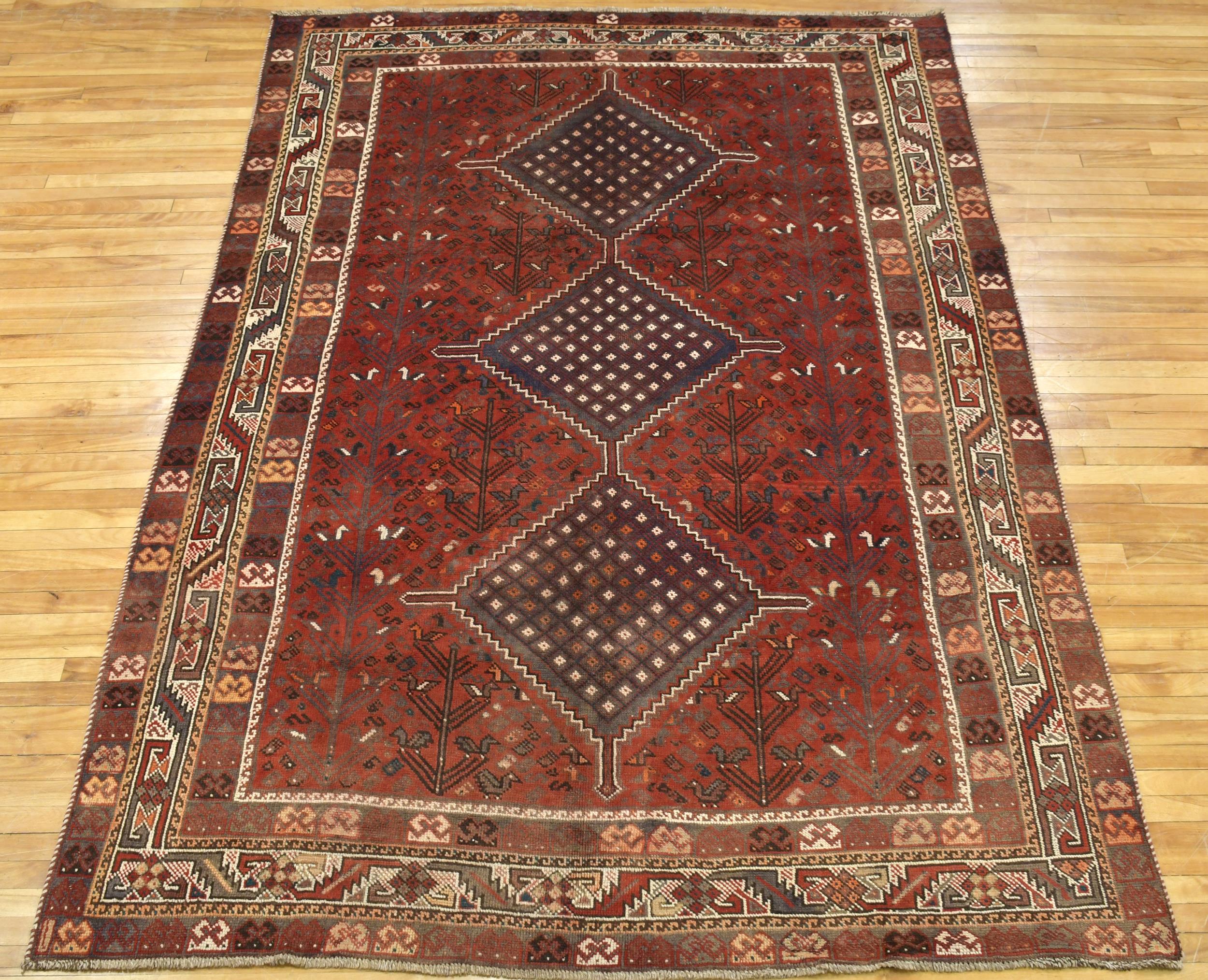 VINTAGE ORIENTAL AREA RUG. Open red