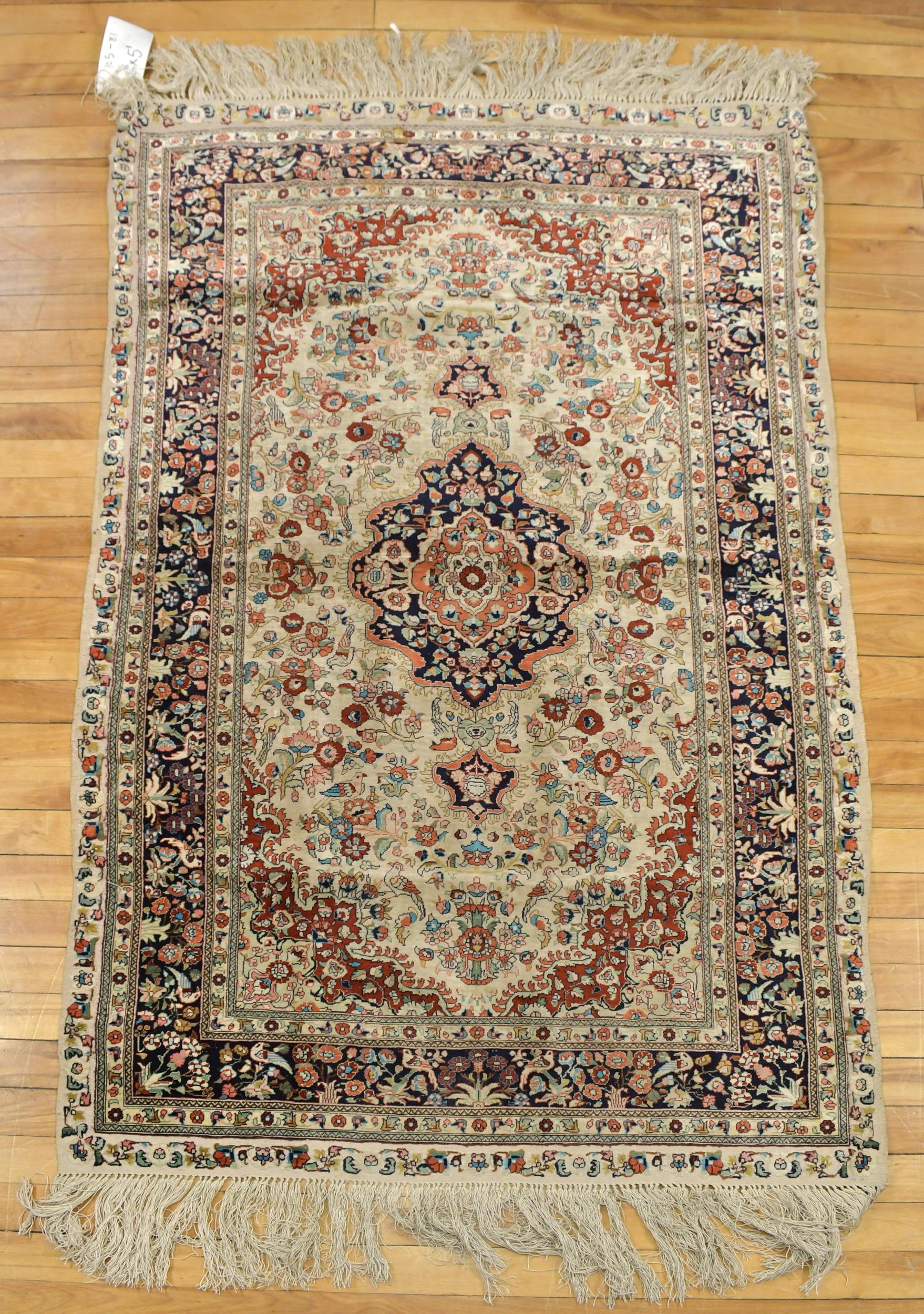 VINTAGE SILK SCATTER RUG. A classic