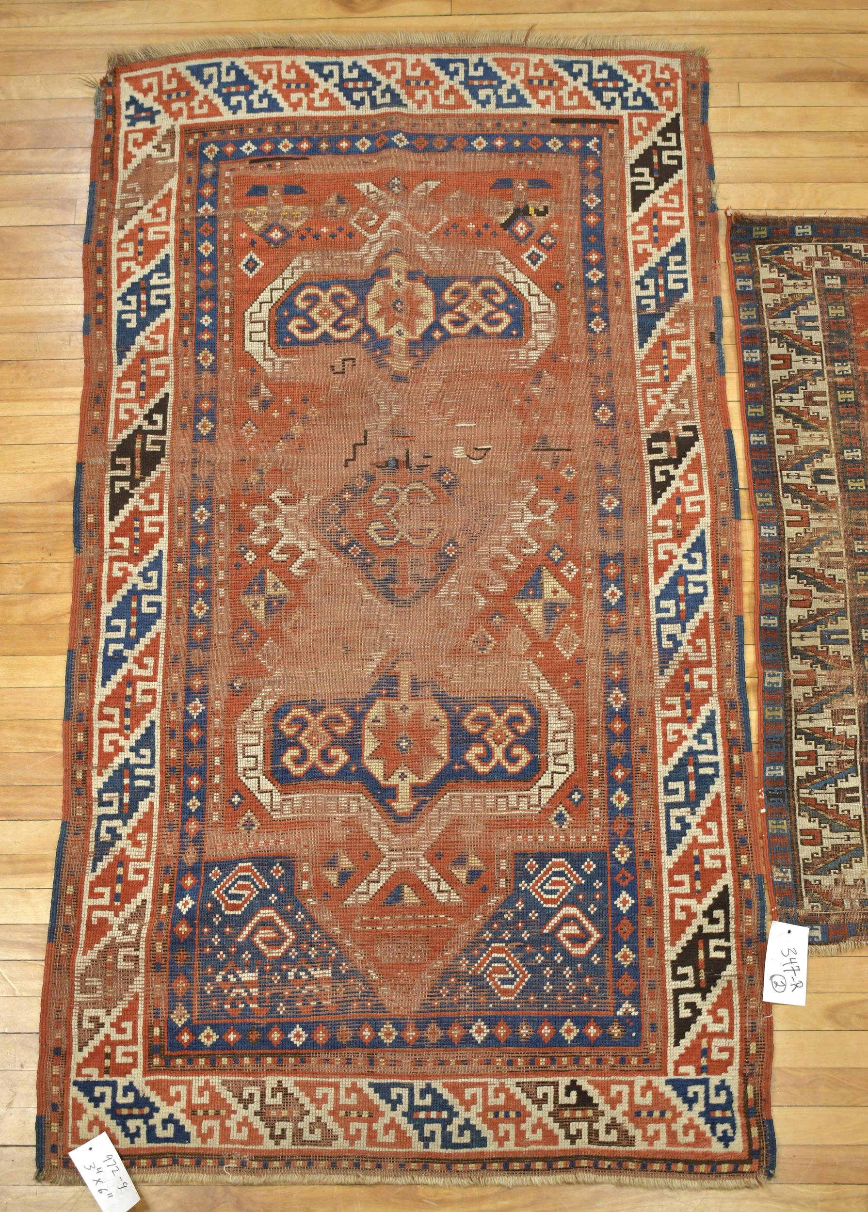TWO ANTIQUE ORIENTAL SCATTER RUGS.