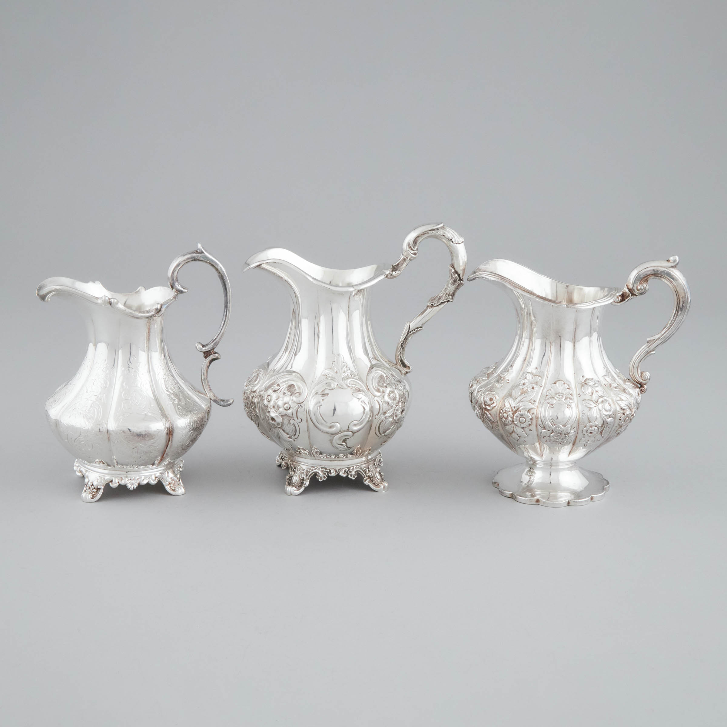Three Victorian Silver Cream Jugs,