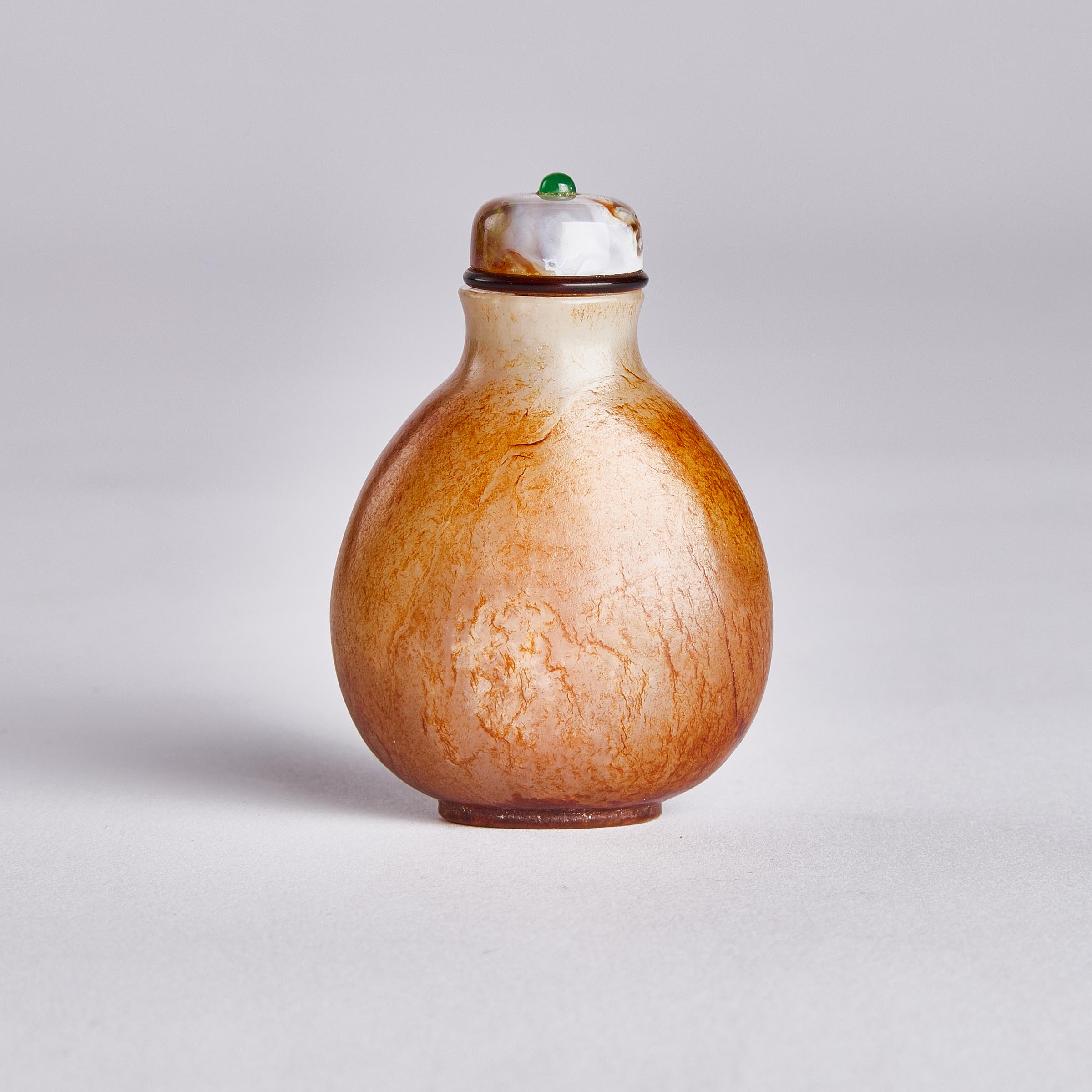 A White and Russet Jade Snuff Bottle,