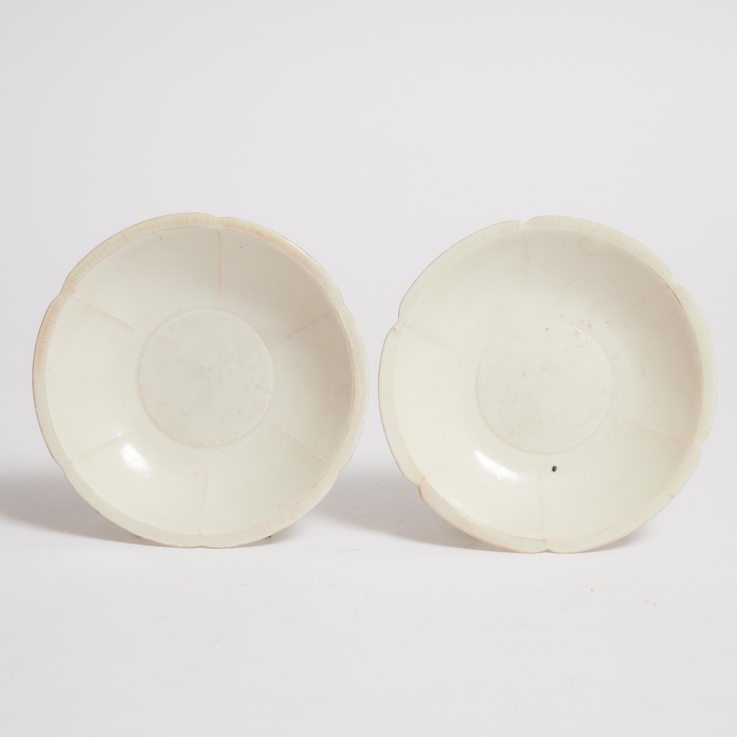 A Pair of Qingbai Floriform Dishes,