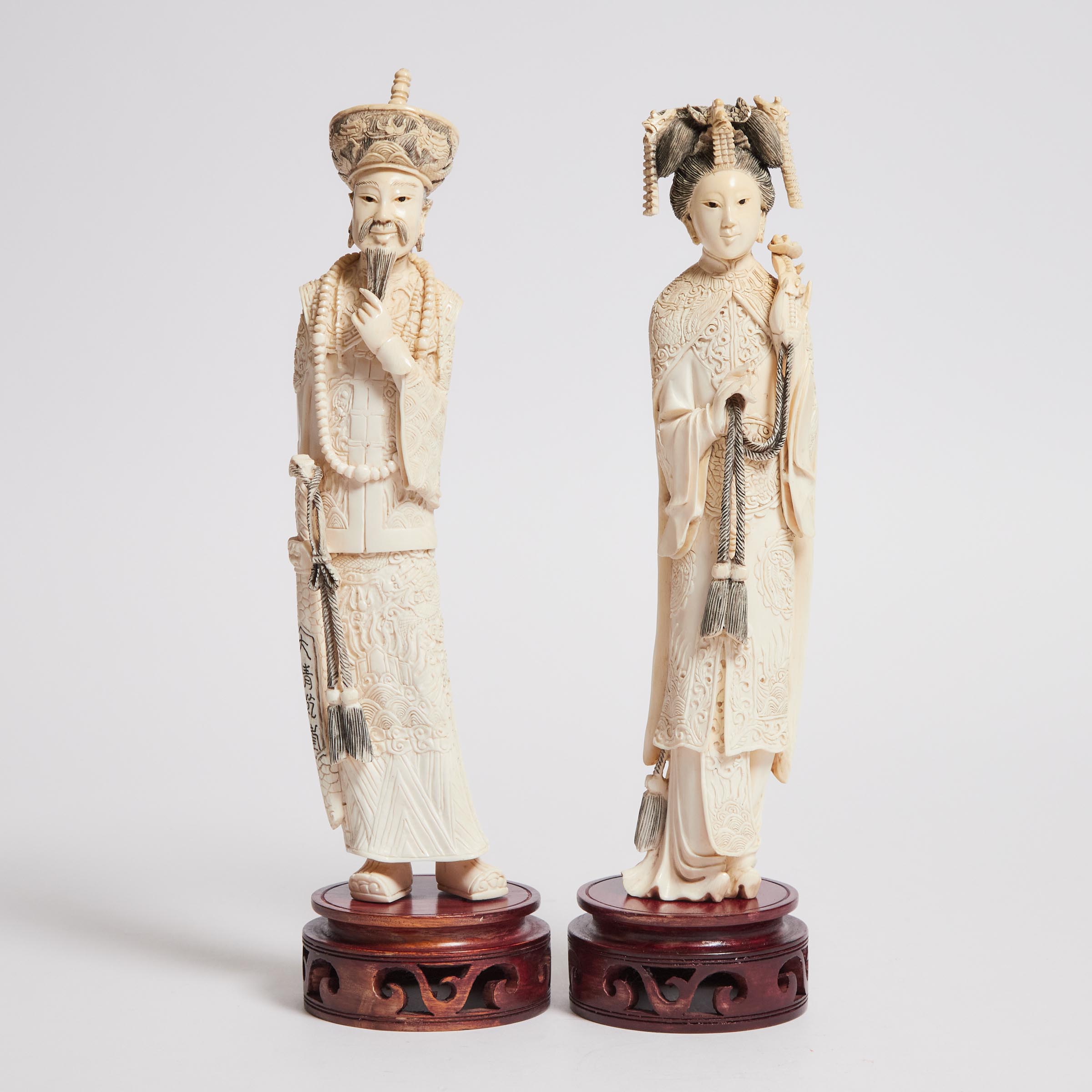 A Pair of Ivory Emperor and Empress