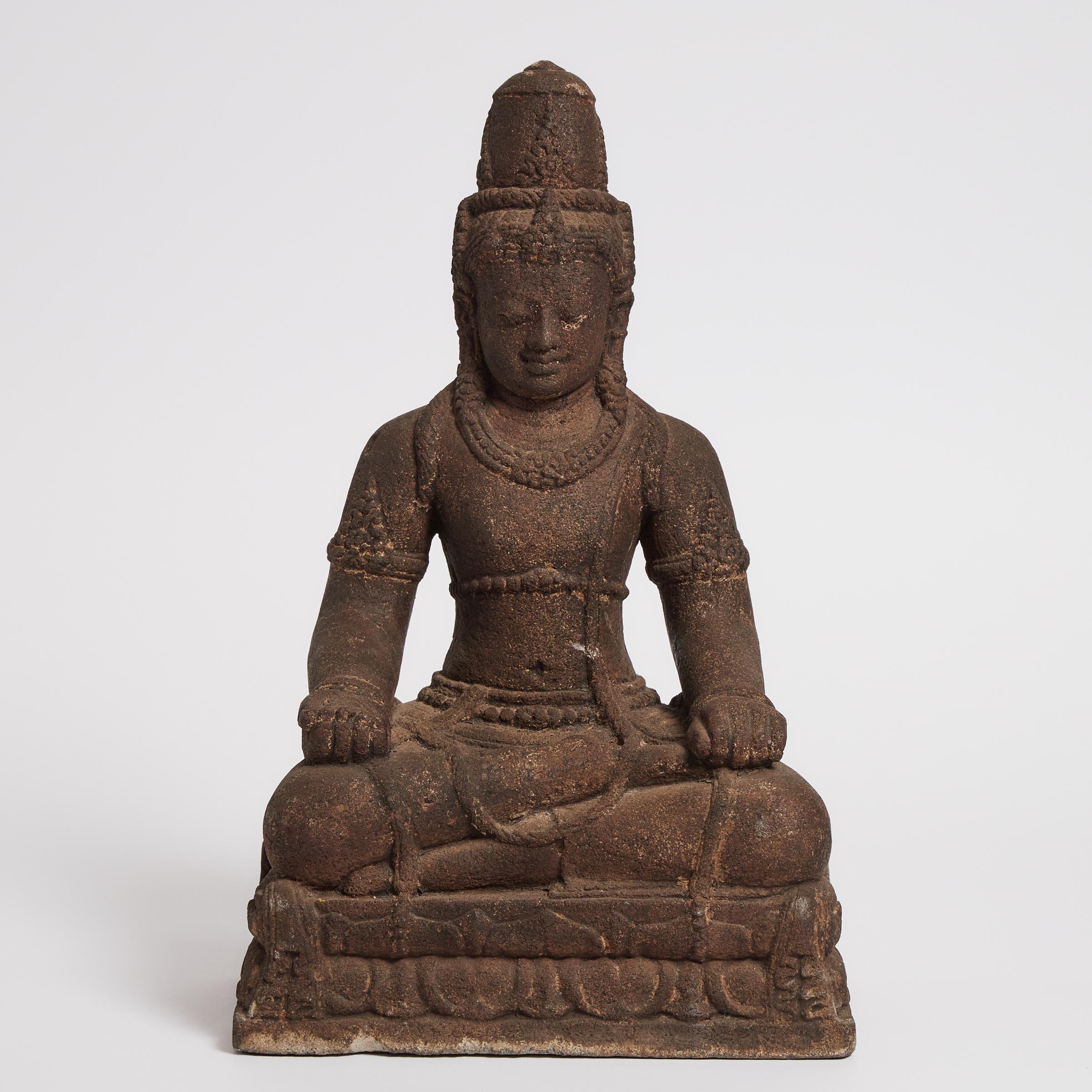 A Volcanic Stone Figure of Buddha,