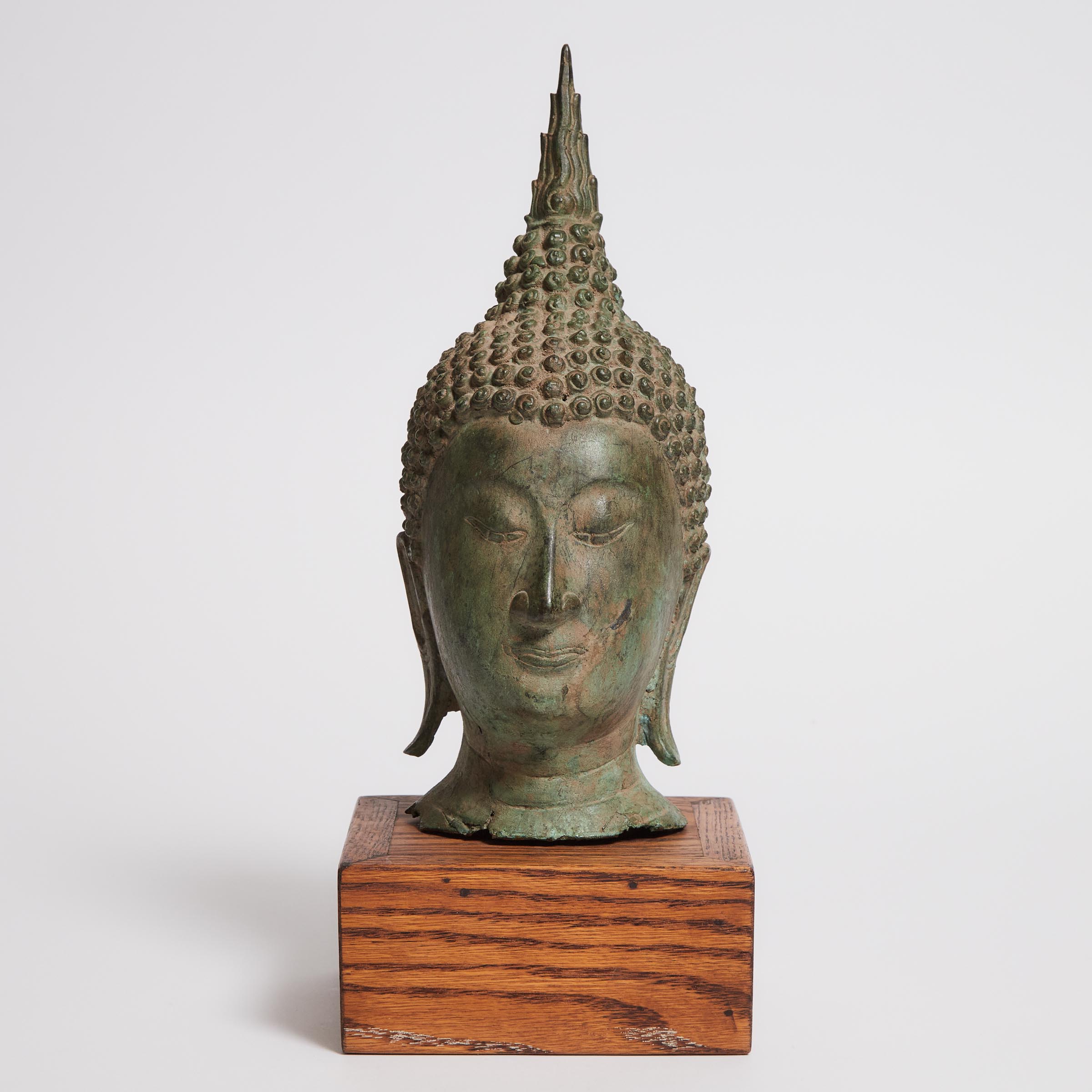 A Thai Bronze Buddha Head Set 3aad58