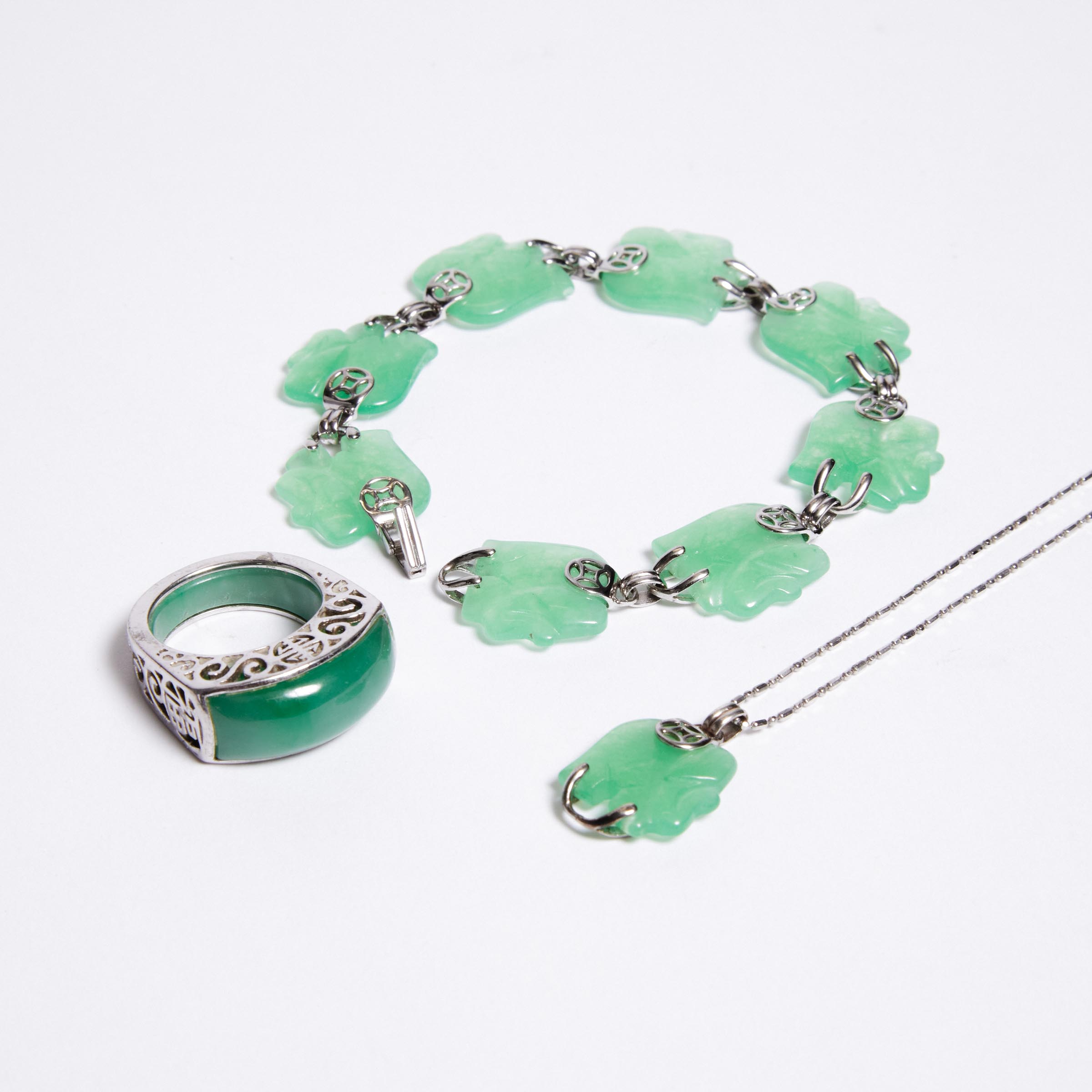 A Set of Three Jadeite Jewellery Pieces,