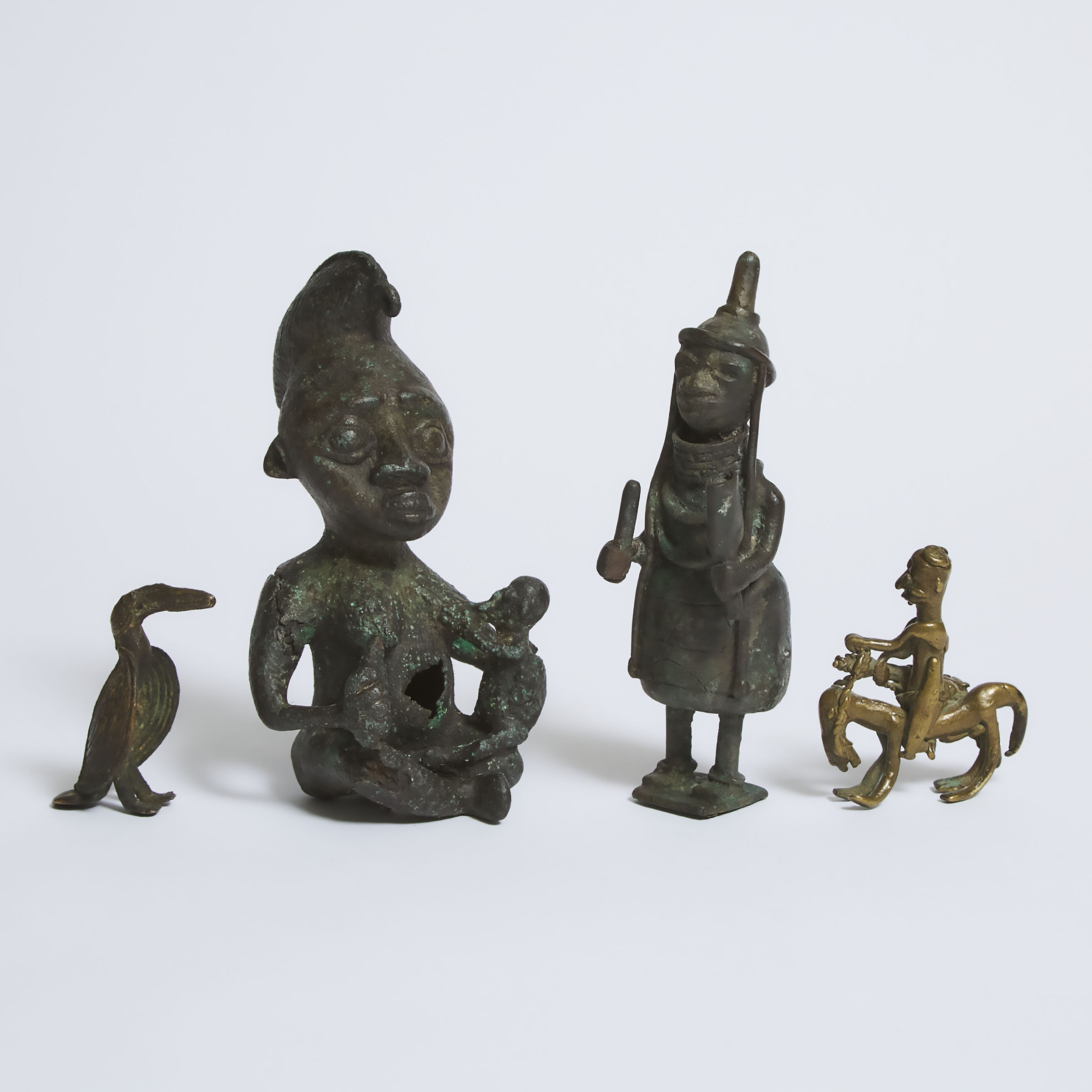 Group of Four African Bronze Sculptures,