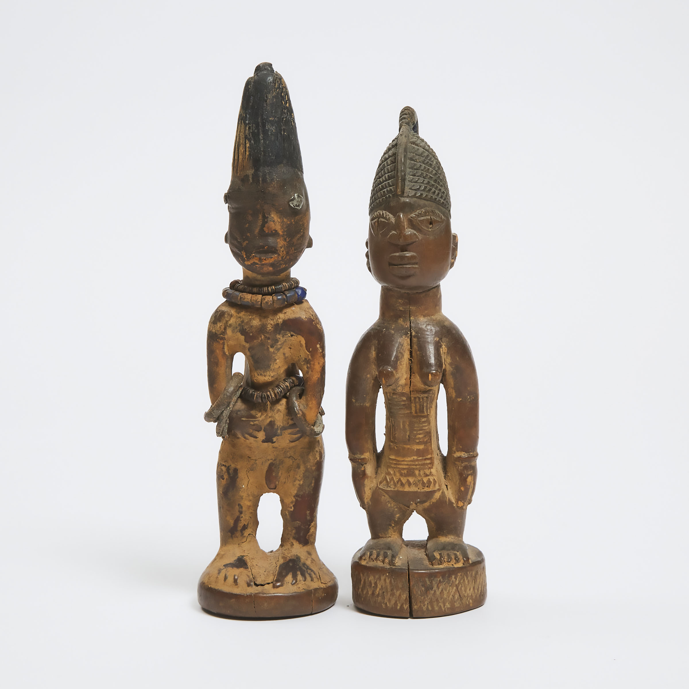 Two Yoruba Ibeji Male and Female Figures,