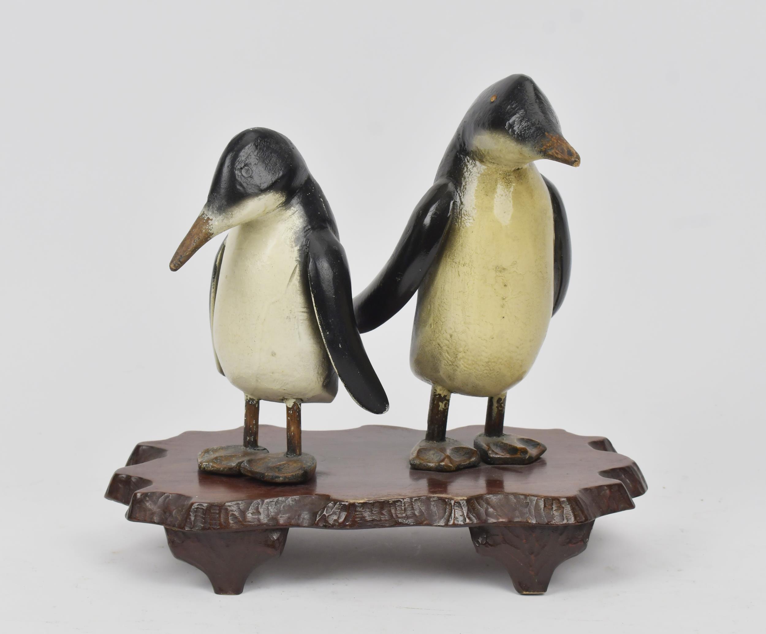 TWO FOLK ART CARVED WOODEN PENGUINS  3ab1da