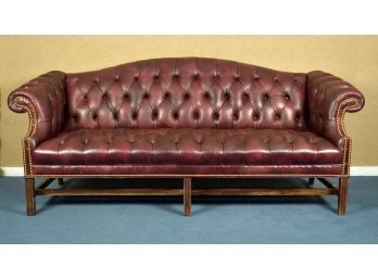 A tufted cordovan leather couch 3ab272