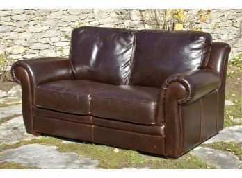 A contemporary two cushion brown