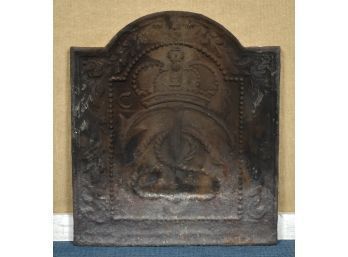 An 18th C. cast iron fire back with