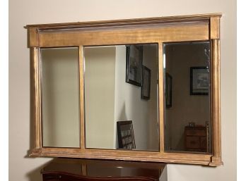 A gilt wood framed over mantle