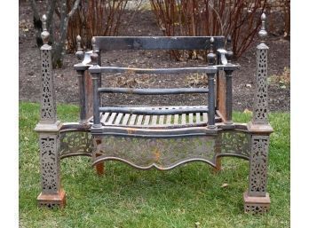 An antique French steel fire place set,