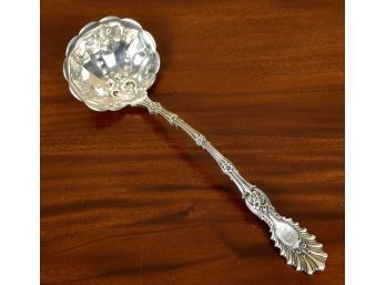 A large sterling silver ladle, with