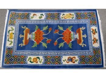 A vintage Tibetan scatter rug,