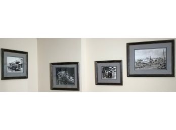 Four framed black and white prints of