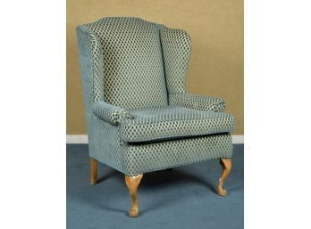 A Queen Anne style wing chair on 3ab489