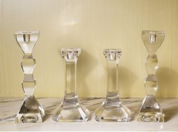 A pair of Orrefors crystal candlesticks