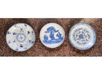 Three blue and white small Chinese plates.