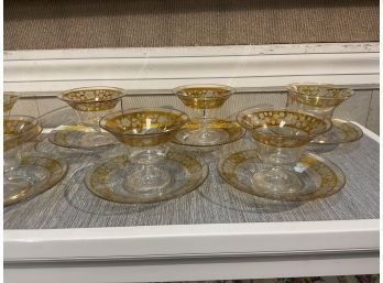 A set of eight vintage etched glass