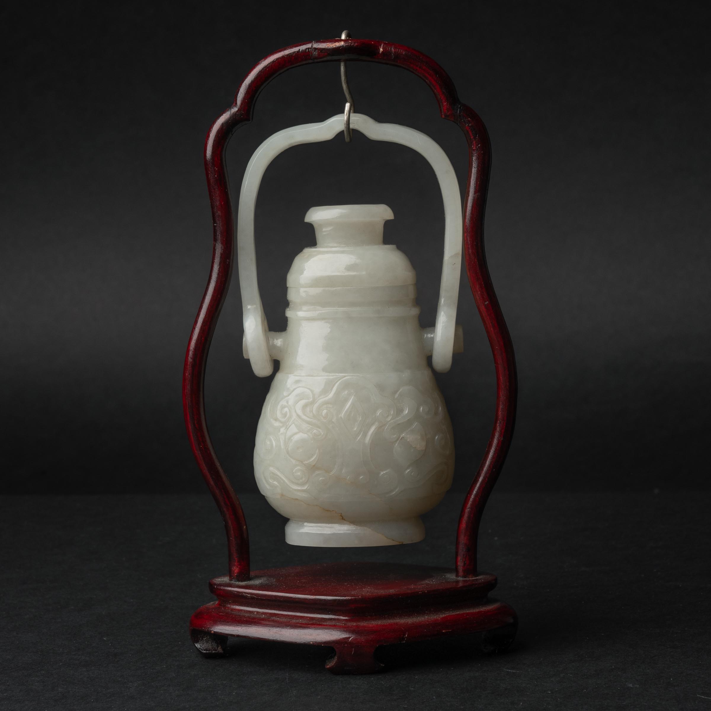 A White Jade 'Taotie' Hanging Vase,