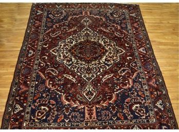A large room size Heriz style rug