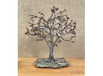 A whimsical wirework tree sculpture