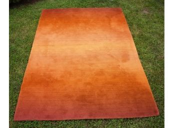 Orange and yellow ombré wool rug by