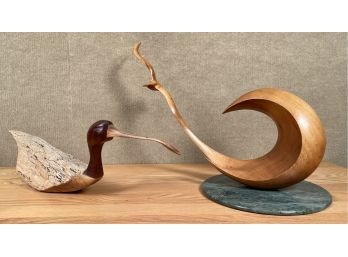 A stylized carved wood swooping