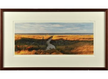 Framed photo of dunes and ocean,