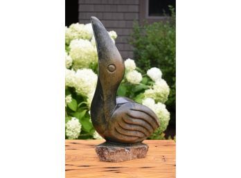 A carved stone bird figure signed 3ab6e9