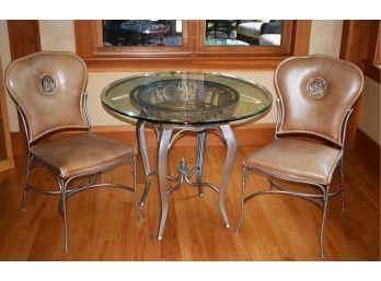 A modern heavy silvered steel table