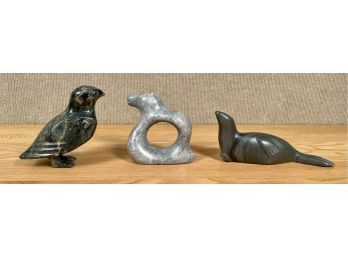 Three signed Inuit carved soapstone