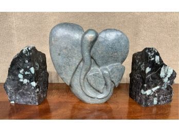 Three pieces of carved stone including  3ab77c